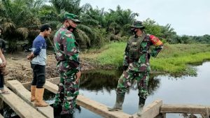 Meskipun Medan Berat, Bukan Menjadi Kendala Bagi TNI Membangun Jalan Program TMMD