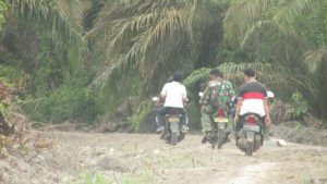 Pasiter naik sepeda motor yakinkan Capaian Pembuatan Jalan Program TMMD