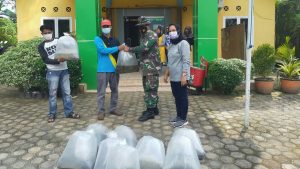Satgas TMMD Kodim Batanghari Salurkan Bantuan Benih Ikan