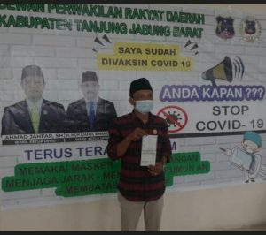 Rayun, Anggota Komisi II DPRD Tanjabbar Jalani Vaksinasi Covid-19 Tahap Pertama