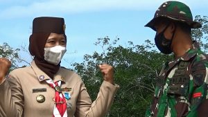 Pramuka SWK Kodim Sarko Sukseskan TMMD Di Desa Bukitberingin