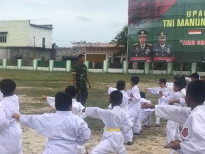 Anggota Satgas TMMD ke 115 Ikut Latih Anak-anak Bela Diri