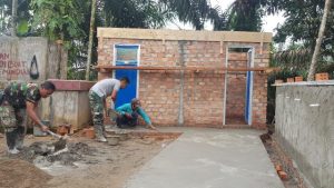 Progres Pembangunan MCK Program TMMD Kodim 0415/Jambi Capai 50 Persen