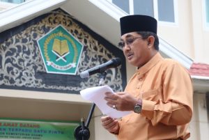 Bupati Tanjab Barat Menjadi Pembina Upacara Peringatan Hari Amal Bhakti ke-77 Kemenag RI