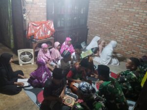 Meskipun Lelah Satgas TMMD Kodim 0416/Bute Semangat Bantu Ustadzah Fitri Ngajar Ngaji