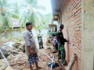 Satgas TMMD Ke-117 Kodim 0416/Bute Goro Pasang Pipa Paralon Untuk Saluran Air Wudhu Musholla Ar-rahman