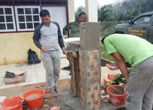 Satgas TMMD Ke-117 Kodim 0416/Bute Bangun Tempat Cuci Tangan Di SD Negeri 57/II Talang Silungko