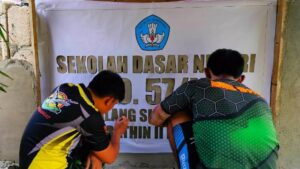 SDN 57/II Talang Silungko Diperindah Satgas TMMD Kodim 0416/BUTE Dengan Papan Nama Baru