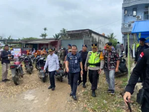 Dansat Brimob Polda Jambi Bersama PJ Bupati Merangin Pantau Suasana Pemungutan Suara