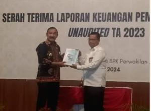 Pj Bupati Kerinci Asraf Serahkan LKPD Ke BPK RI Perwakilan Jambi