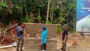 Pembuatan Tugu TMMD di Desa Sukamaju Menjadi Simbol Komitmen TNI untuk Masyarakat