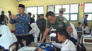 Program Makan Bergizi Gratis Resmi Bergulir di Muaro Jambi, Letkol Inf Beni: Siswa Senang dan Antusias!